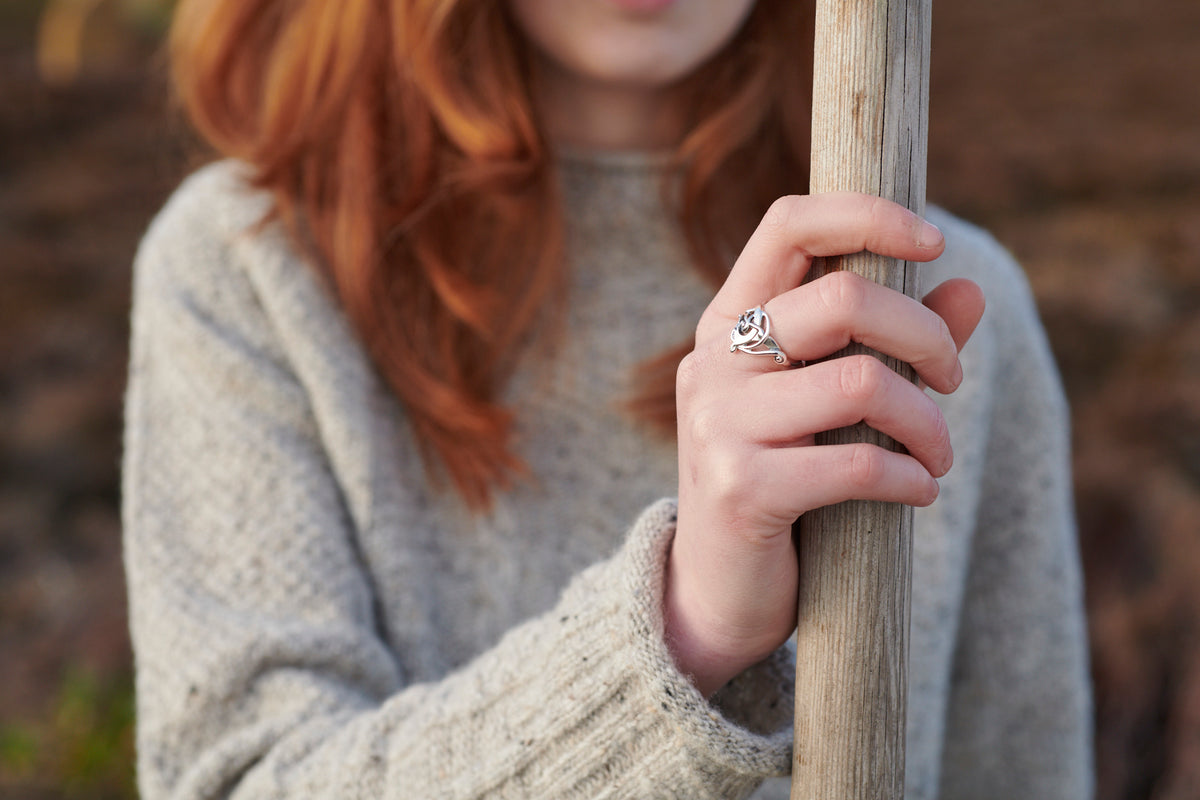 Close up of woman wearing an ring from the Finnish Beast Collection