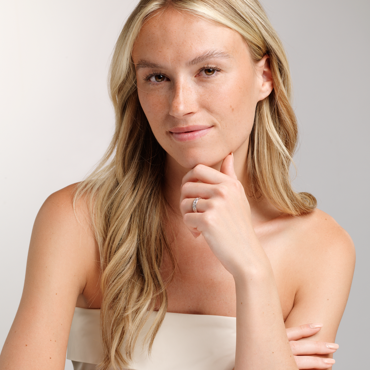 woman wearing white top and Rysa ring