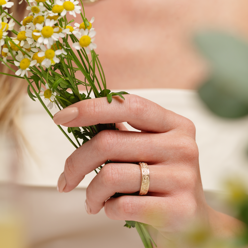 Model wearing Ola Gorie gold Rysa ladies ring, Celtic wedding