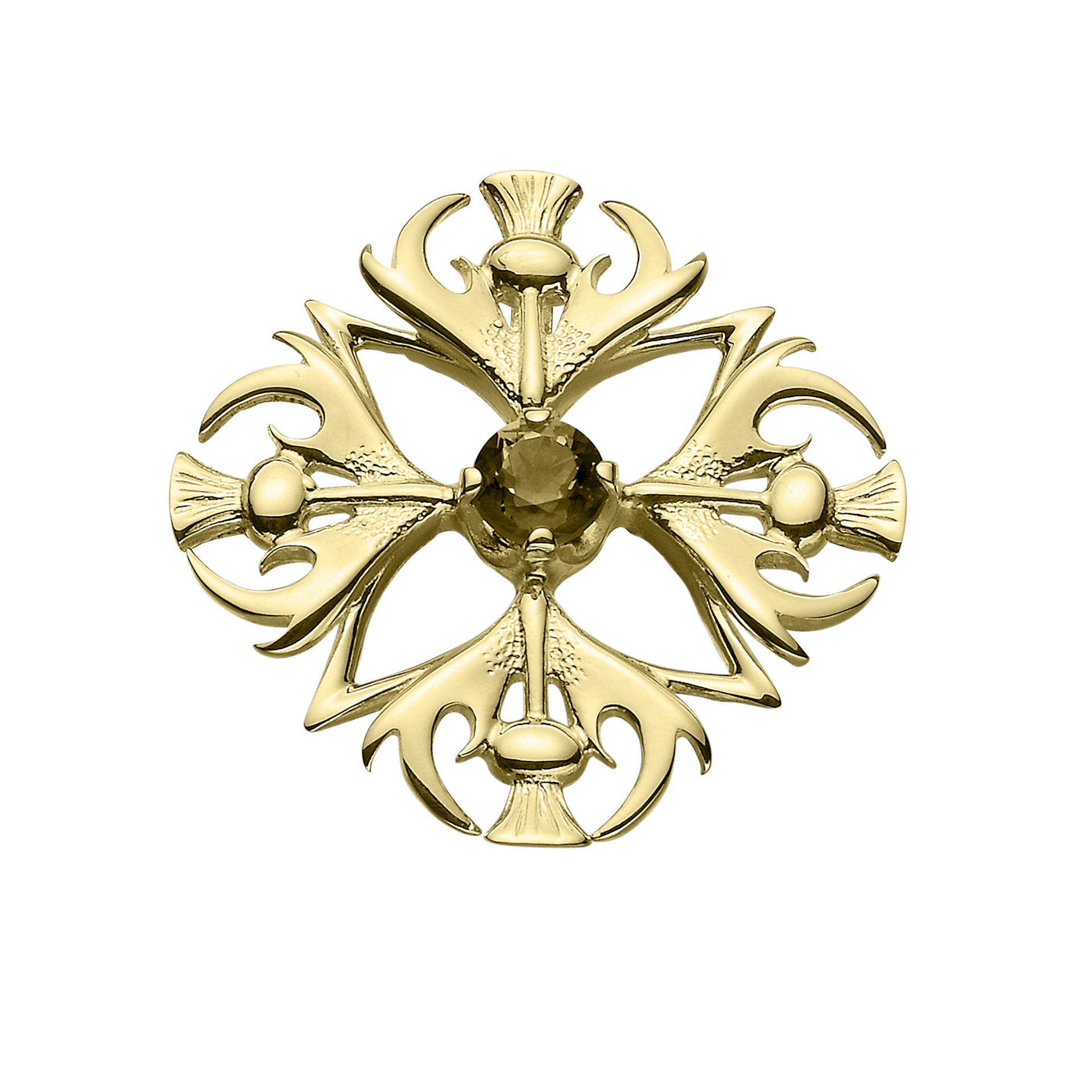 A gold brooch with a central gem stone with a thistle design
