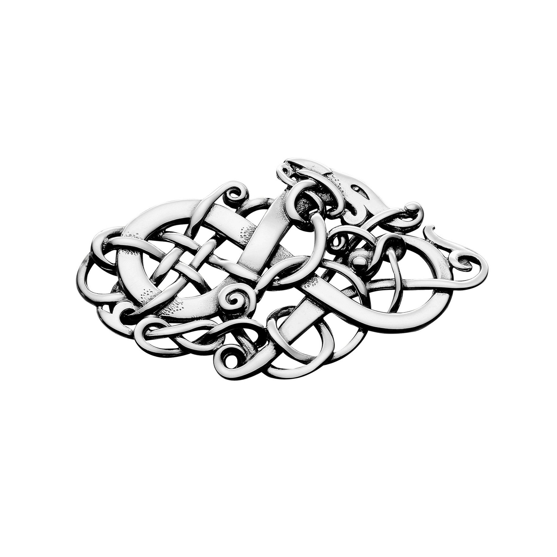 A silver brooch with Twisting, plant-like tendril design from the Alskog Collection