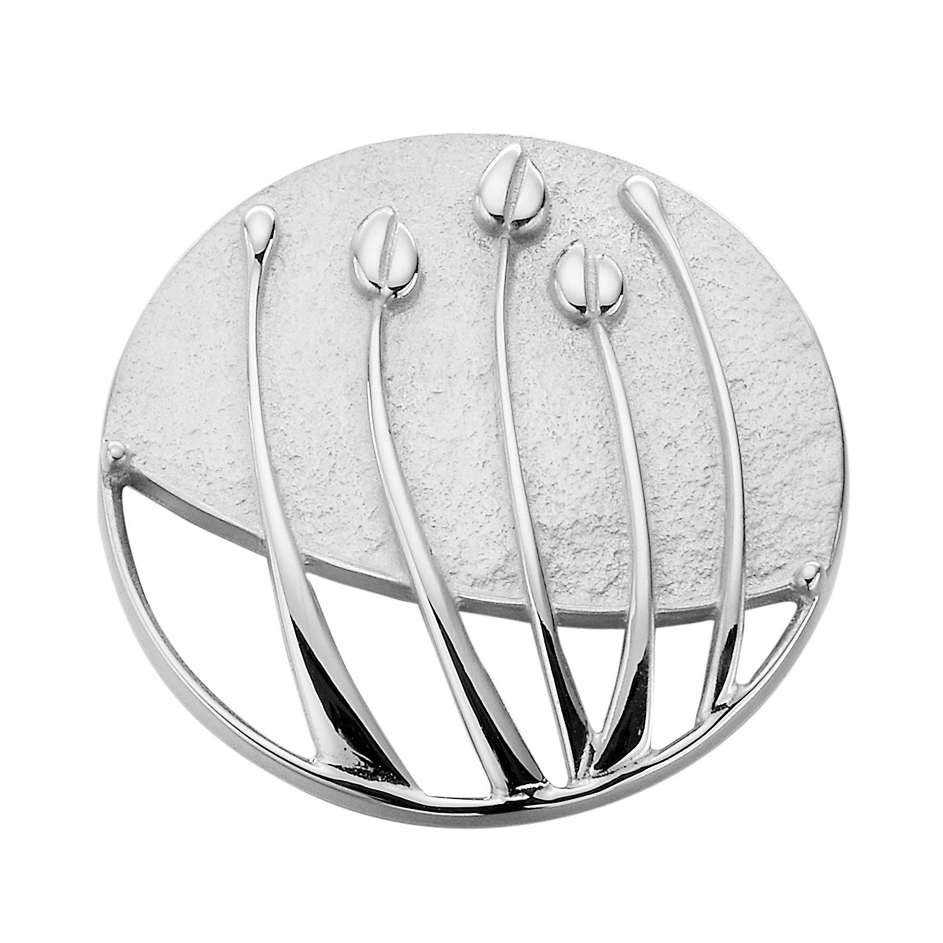 A oval silver brooch with a intricate plant design from the Rose Boudoir Collection