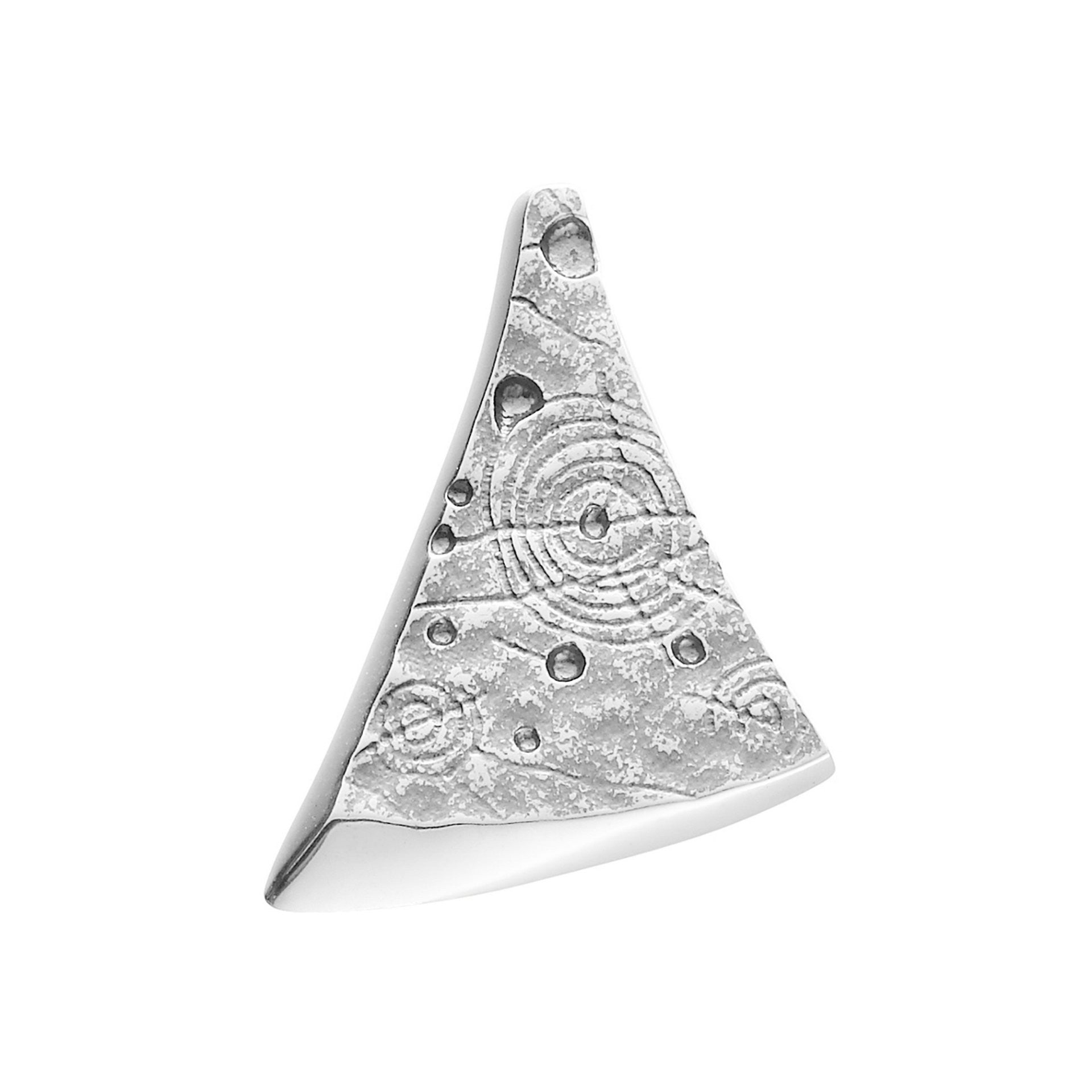 A triangular silver brooch with detailed geometric design from the Kilmartin Collection