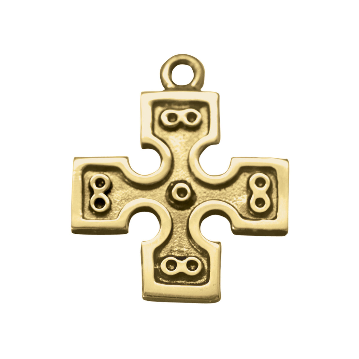 A gold charm in the shape of a cross with intricate designs and circular patterns.