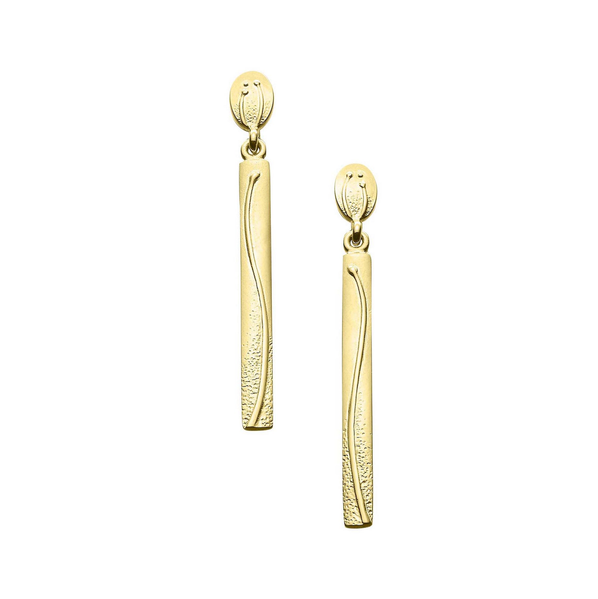A pair of oval and pendant gold drop earrings with a flower design from the Machair Collection