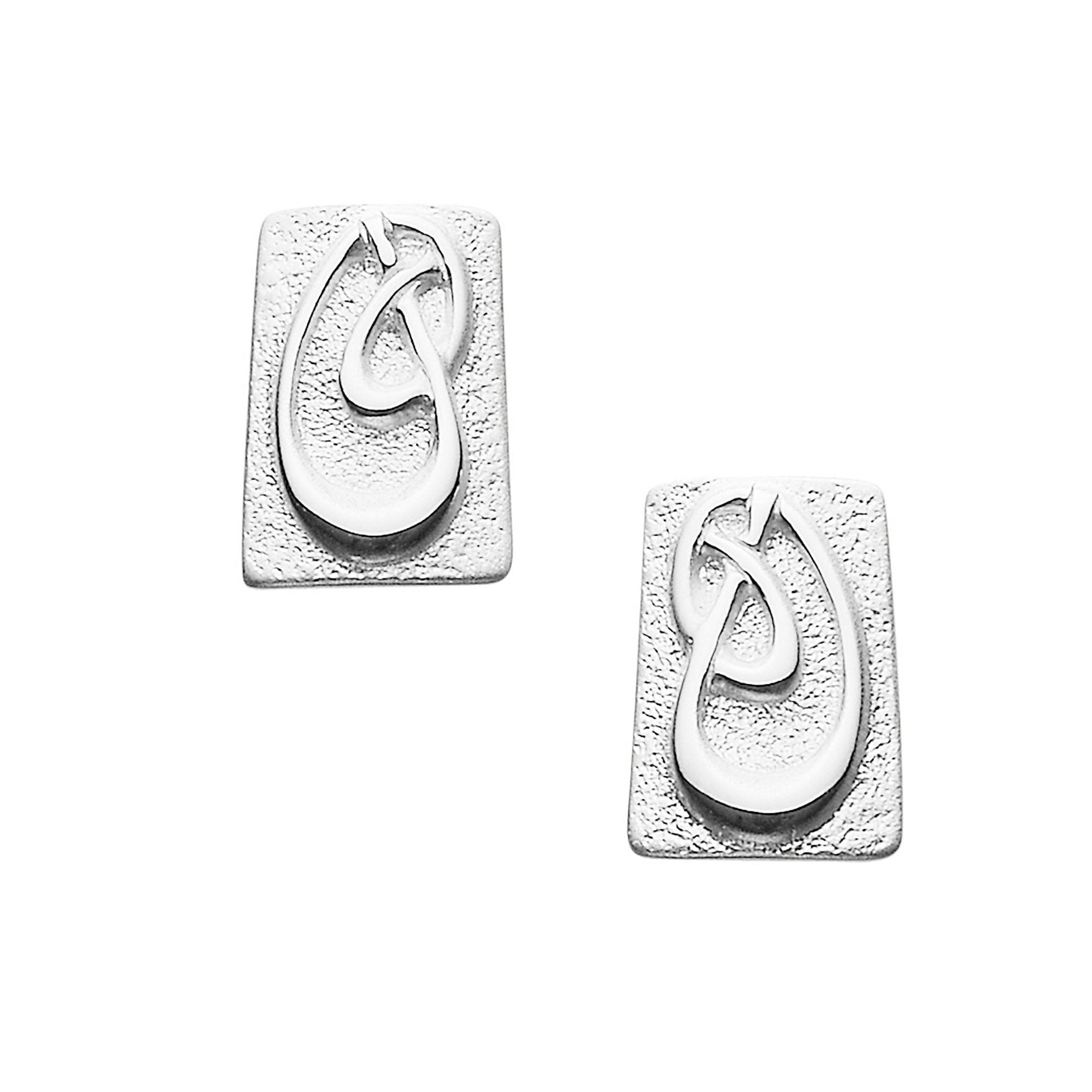 A pair of square silver stud earrings with a knot design from the Aikerness Collection