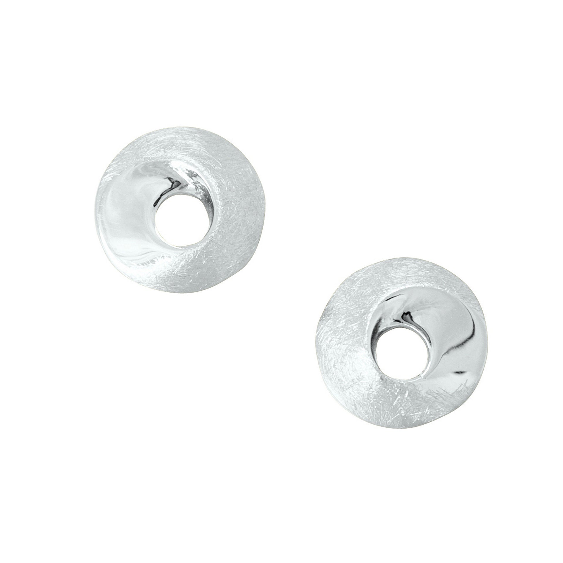 A pair of circular silver stud earrings with a contemporary design