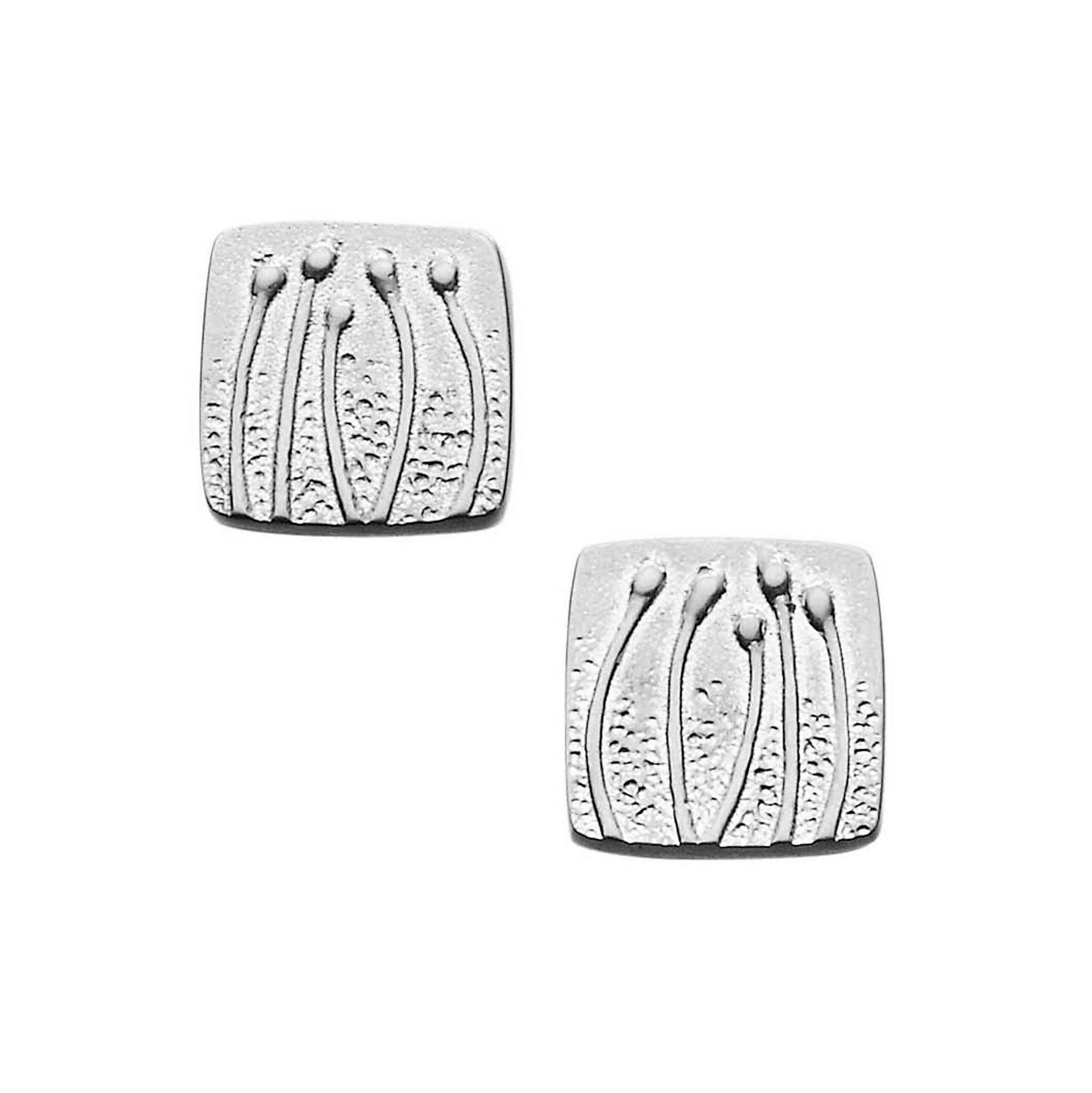A pair of square silver stud earrings with a flower design from the Machair Collection