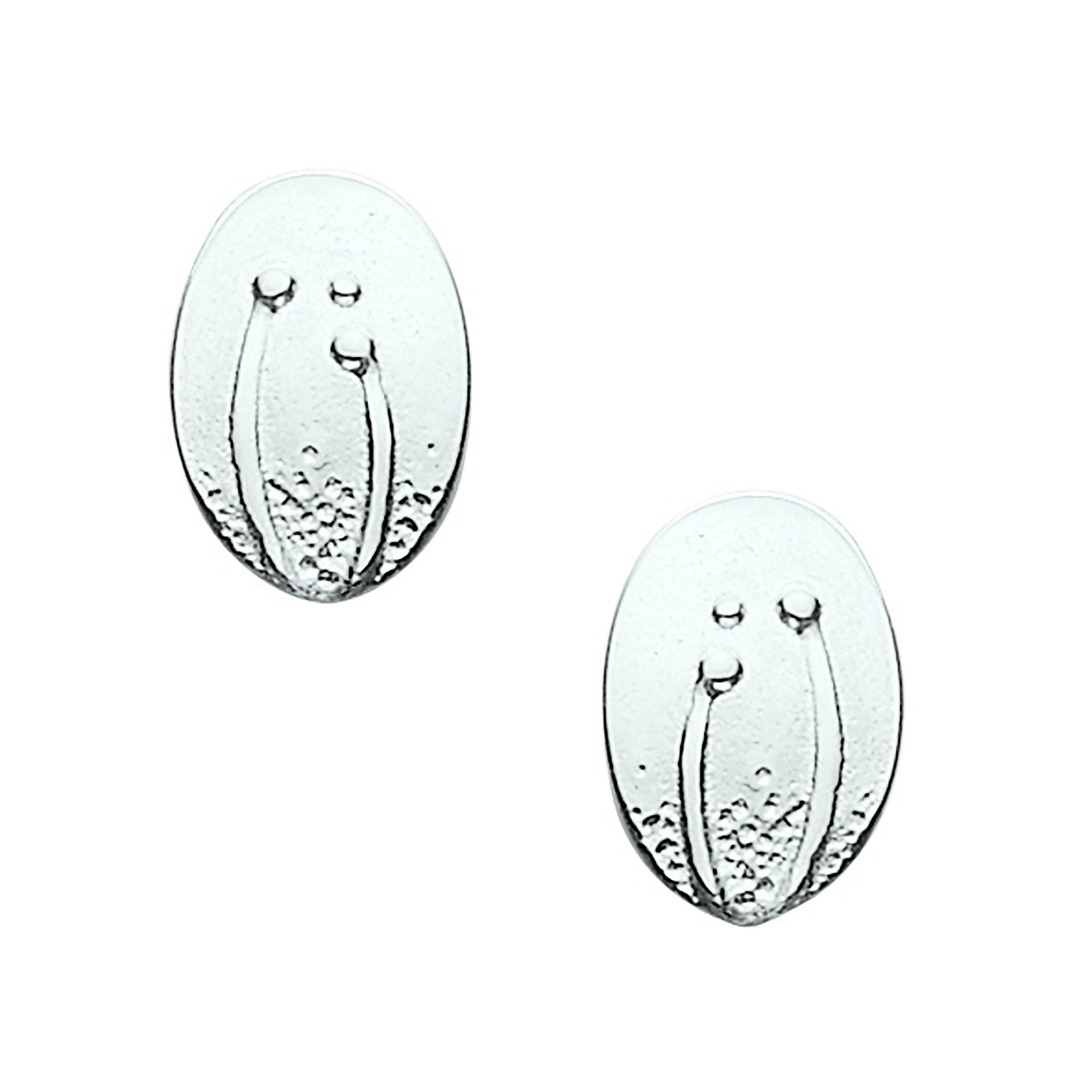 A pair of oval silver stud earrings with a flower design from the Machair Collection