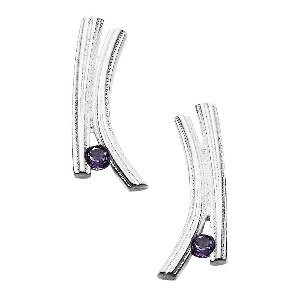 A pair of silver earrings with a contemporary design with a purple gem stone at the bottom of each one