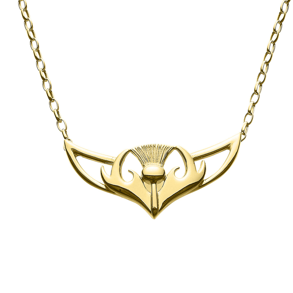 A gold necklace with a intricate, thistle design, suspended from a chain.