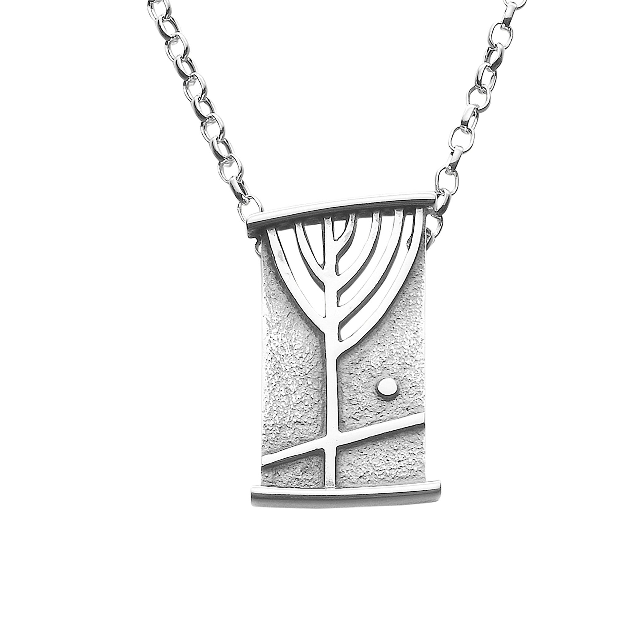 A silver necklace featuring a Rune shaped pendant with intricate detailing.