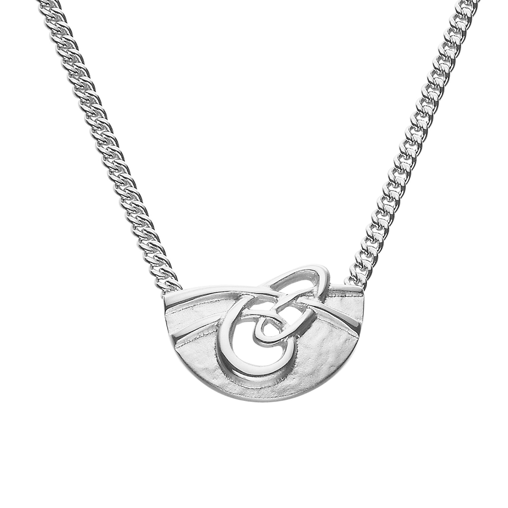 A close up of a silver  half circle pendant necklace with a celtic knot design from the Aikerness Collection