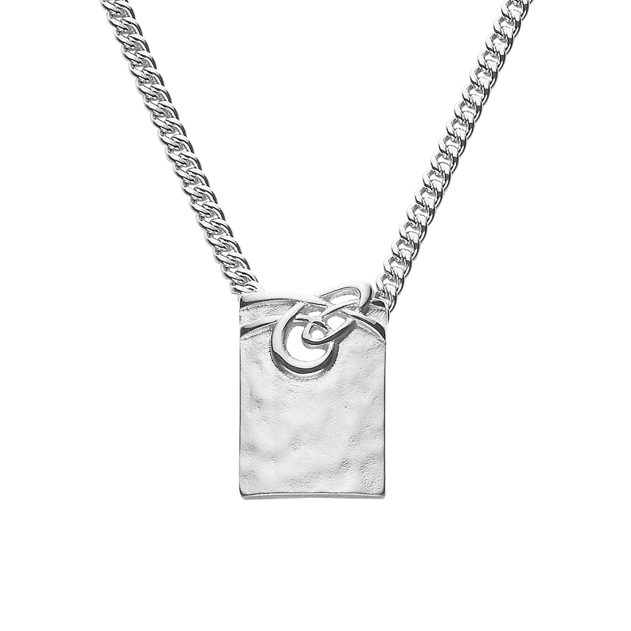 A close up of a silver pendant necklace with a celtic knot design from the Aikerness Collection