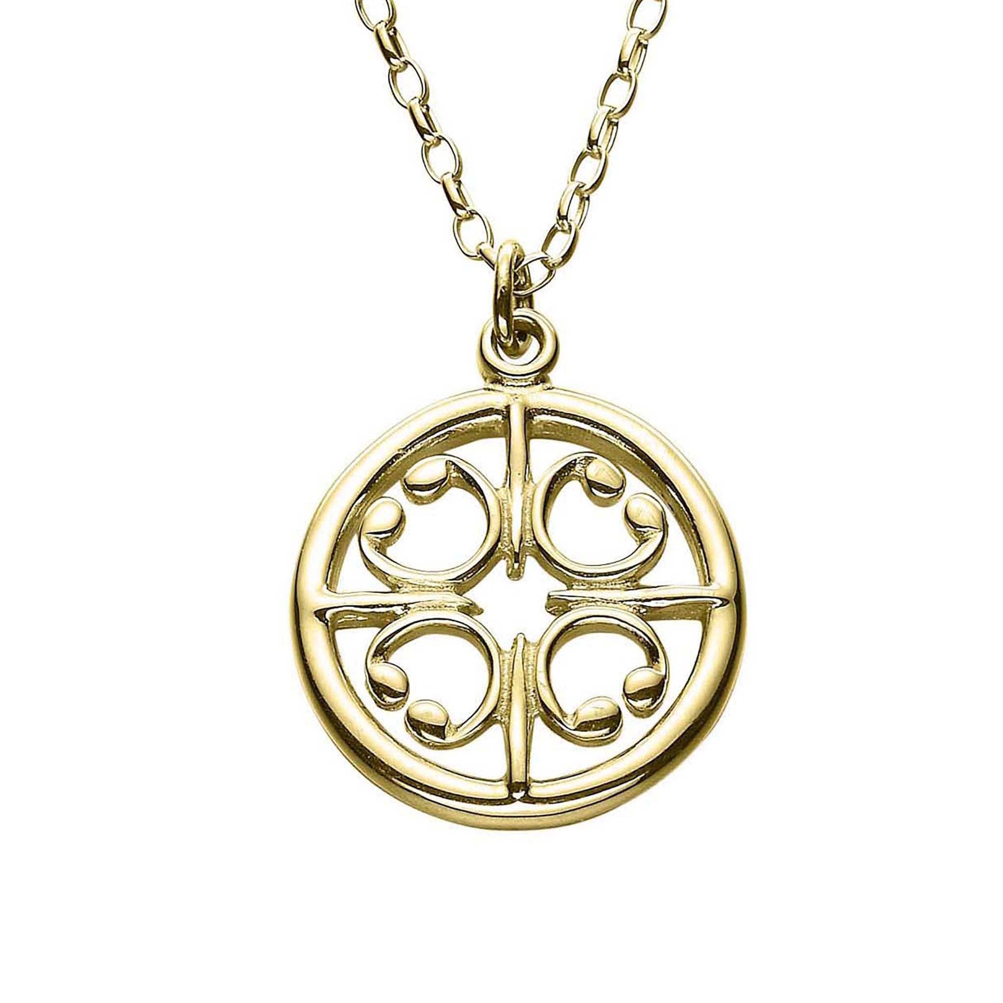 A gold circular pendant on a chain with a beautiful window design as found in the St Magnus Cathedral