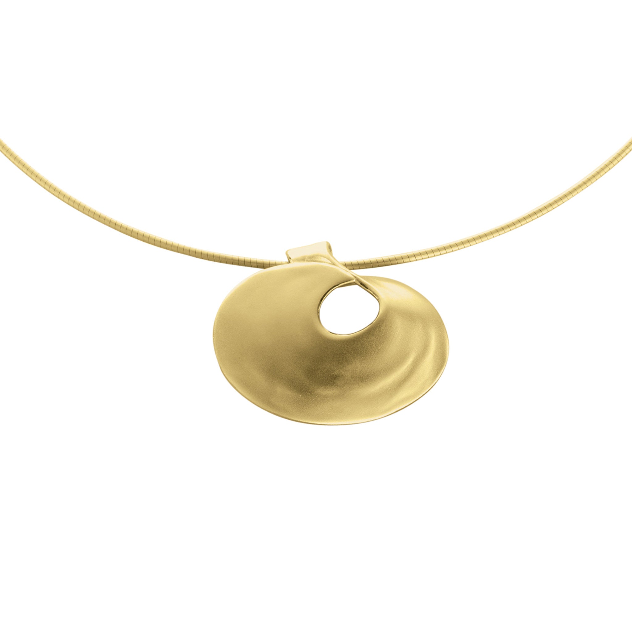 A large gold pendant with a single swirl representing pools of water in strong currents
