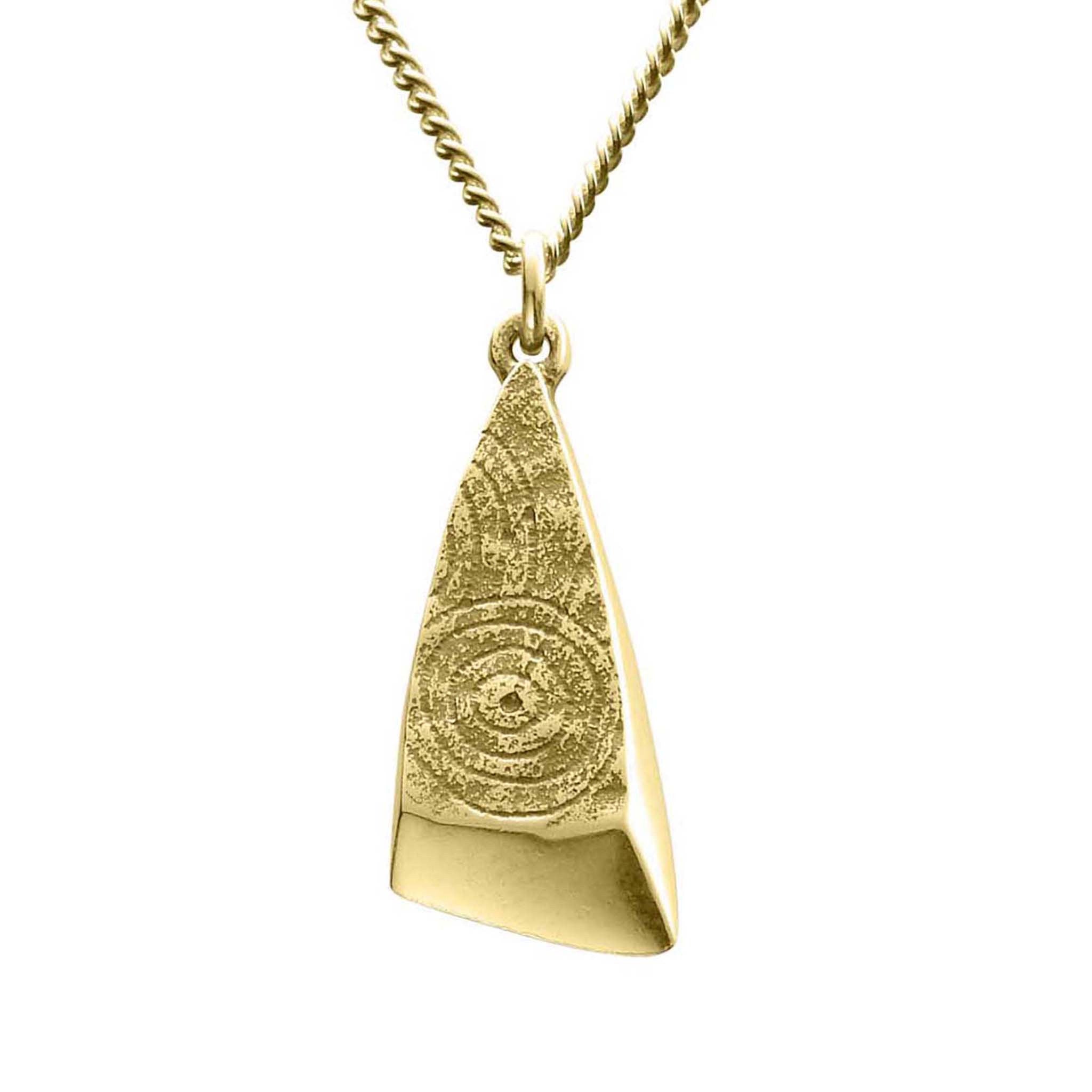 A short triangular gold pendant with a geometric pattern, suspended by a chain.