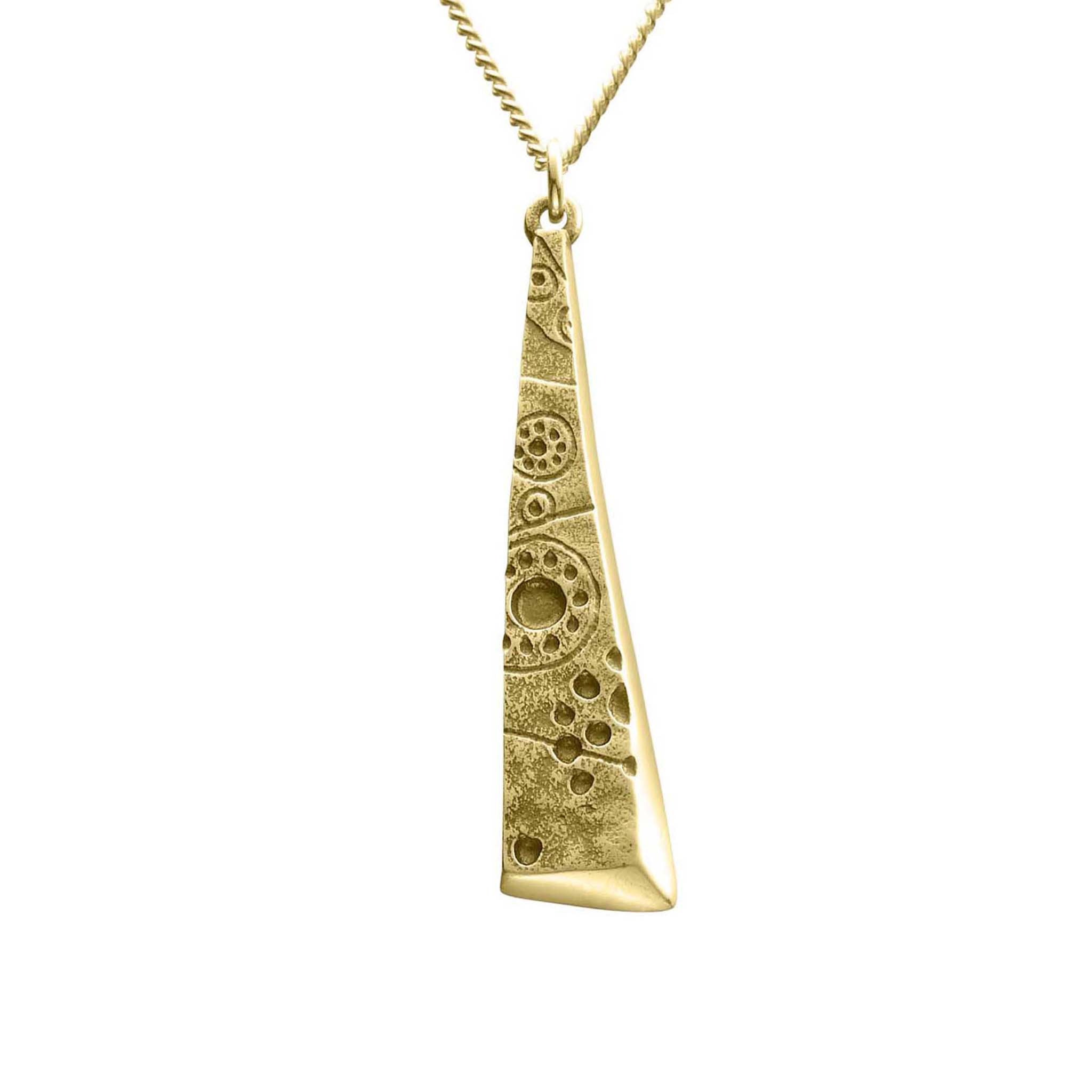 A long triangular gold pendant with a geometric pattern, suspended by a chain.