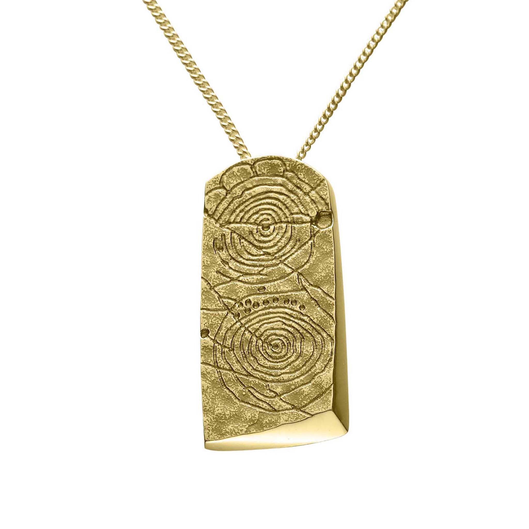 A large rectangular gold pendant with a geometric pattern, suspended by a chain.