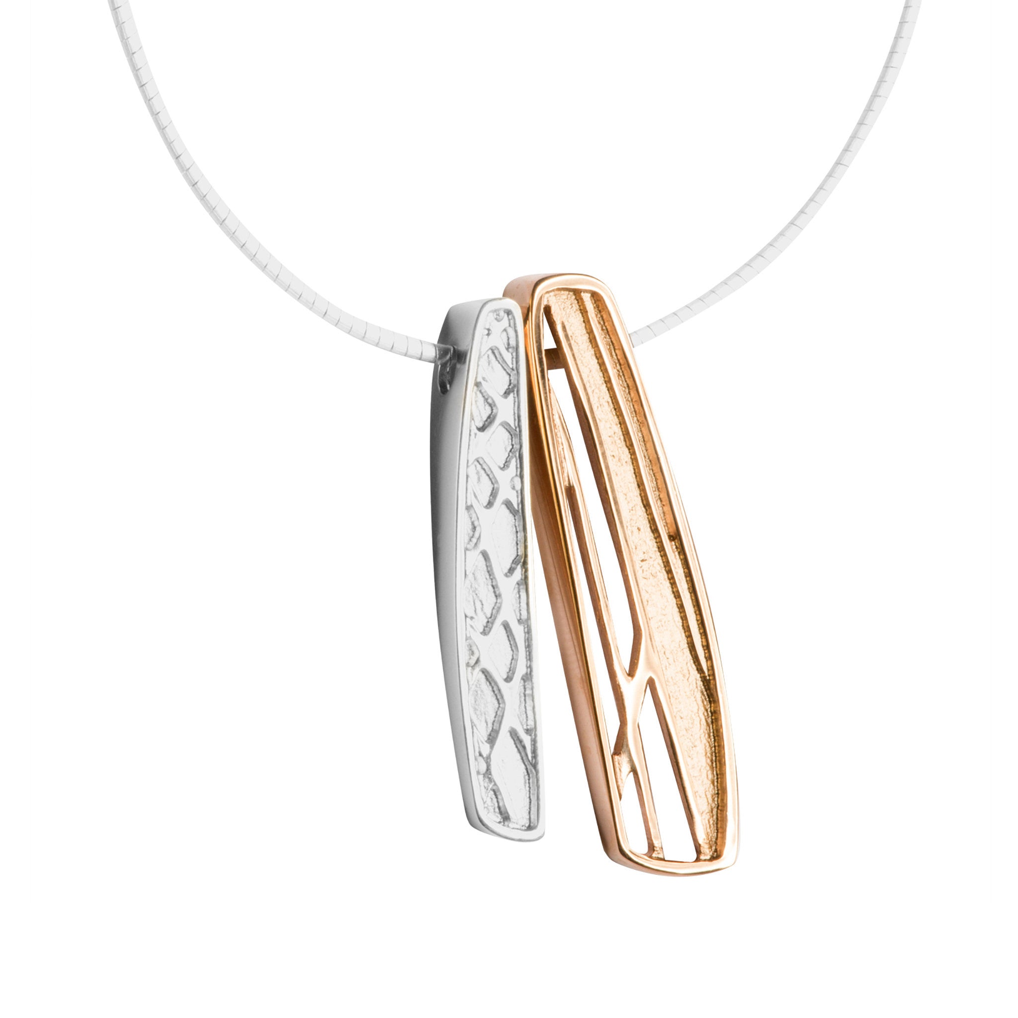 A two-tone pendant necklace with a silver and rose gold finish, featuring intricate textured designs and a geometric pattern.