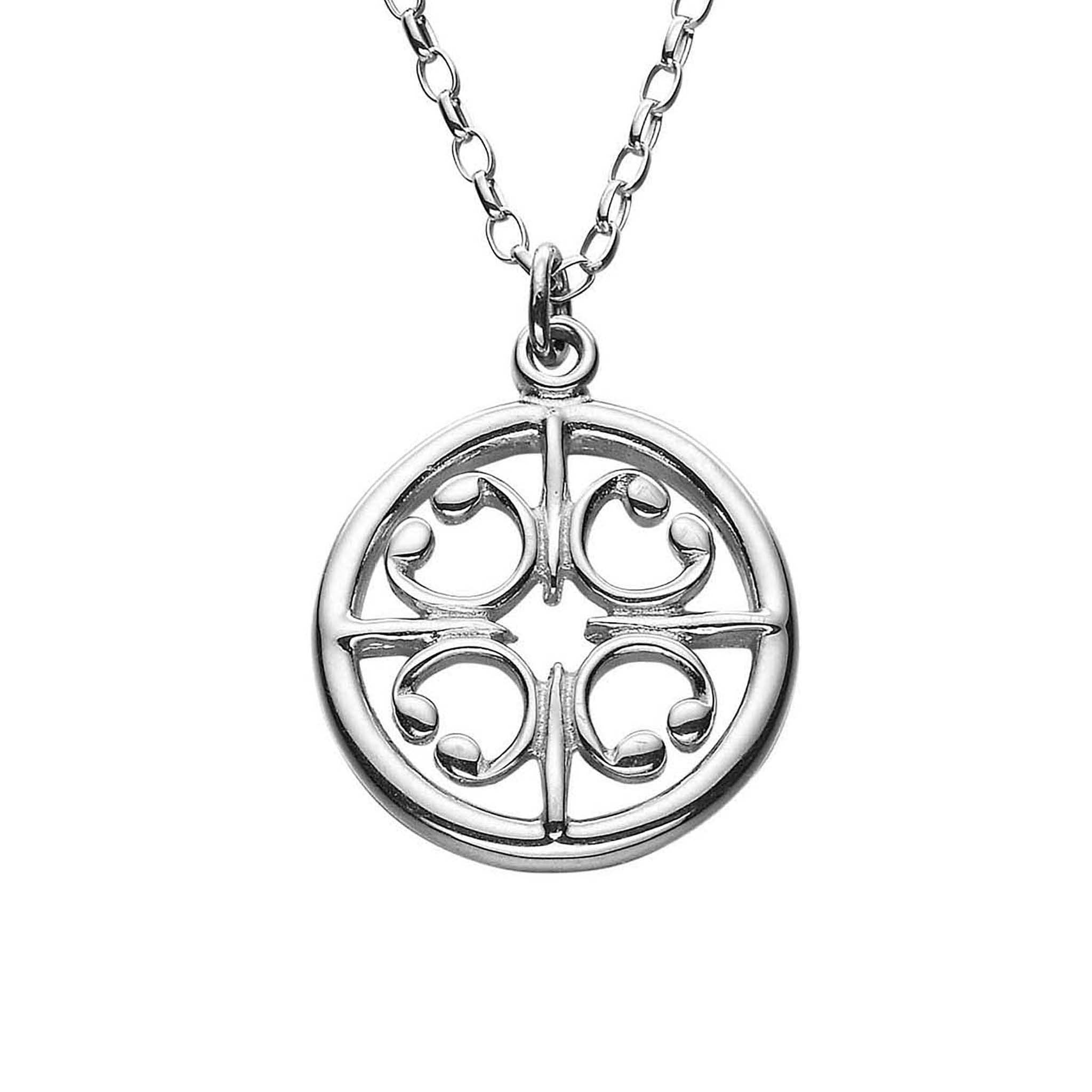 A silver circular pendant necklace on a chain, featuring an intricate geometric design.