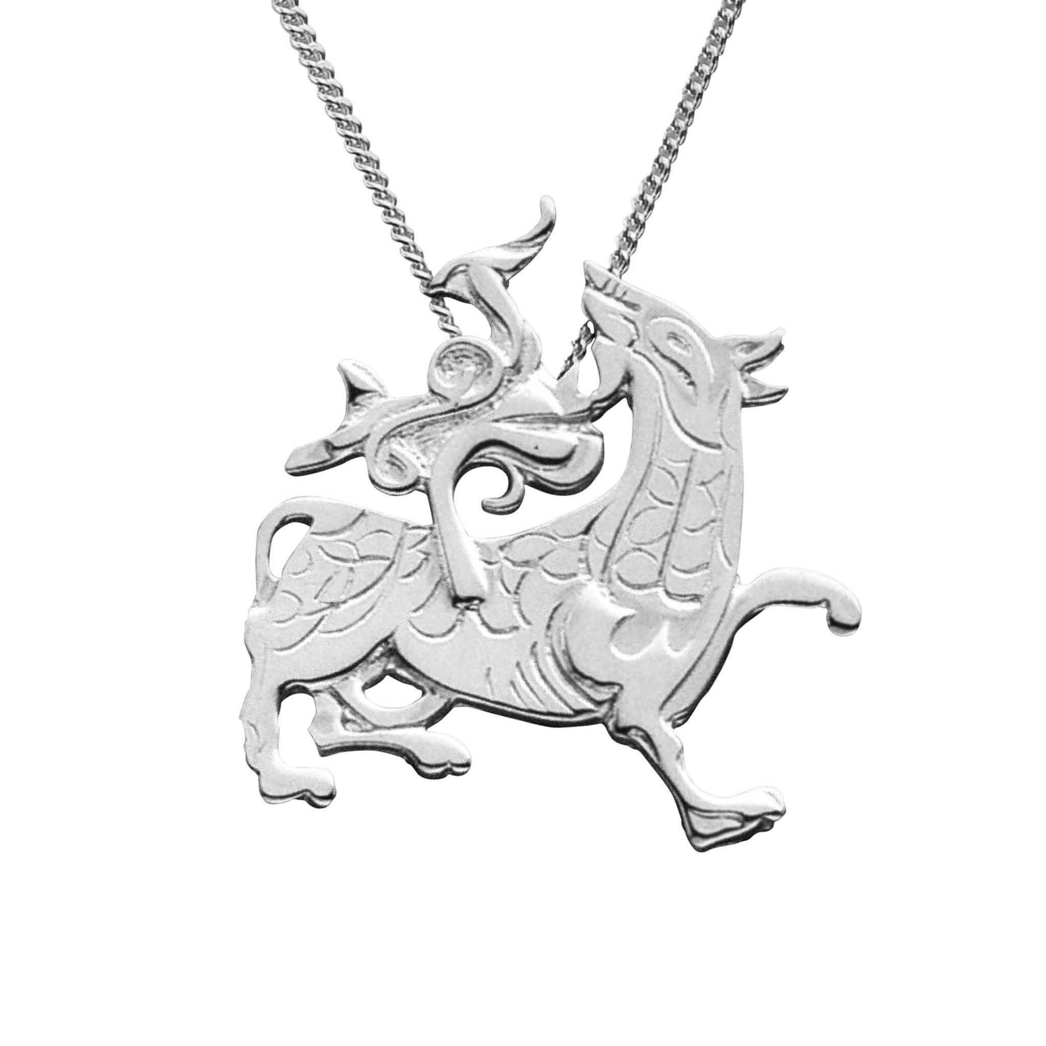 A silver necklace featuring a detailed dragon pendant, inspired by the Viking carvings at Maeshowe in Orkney.