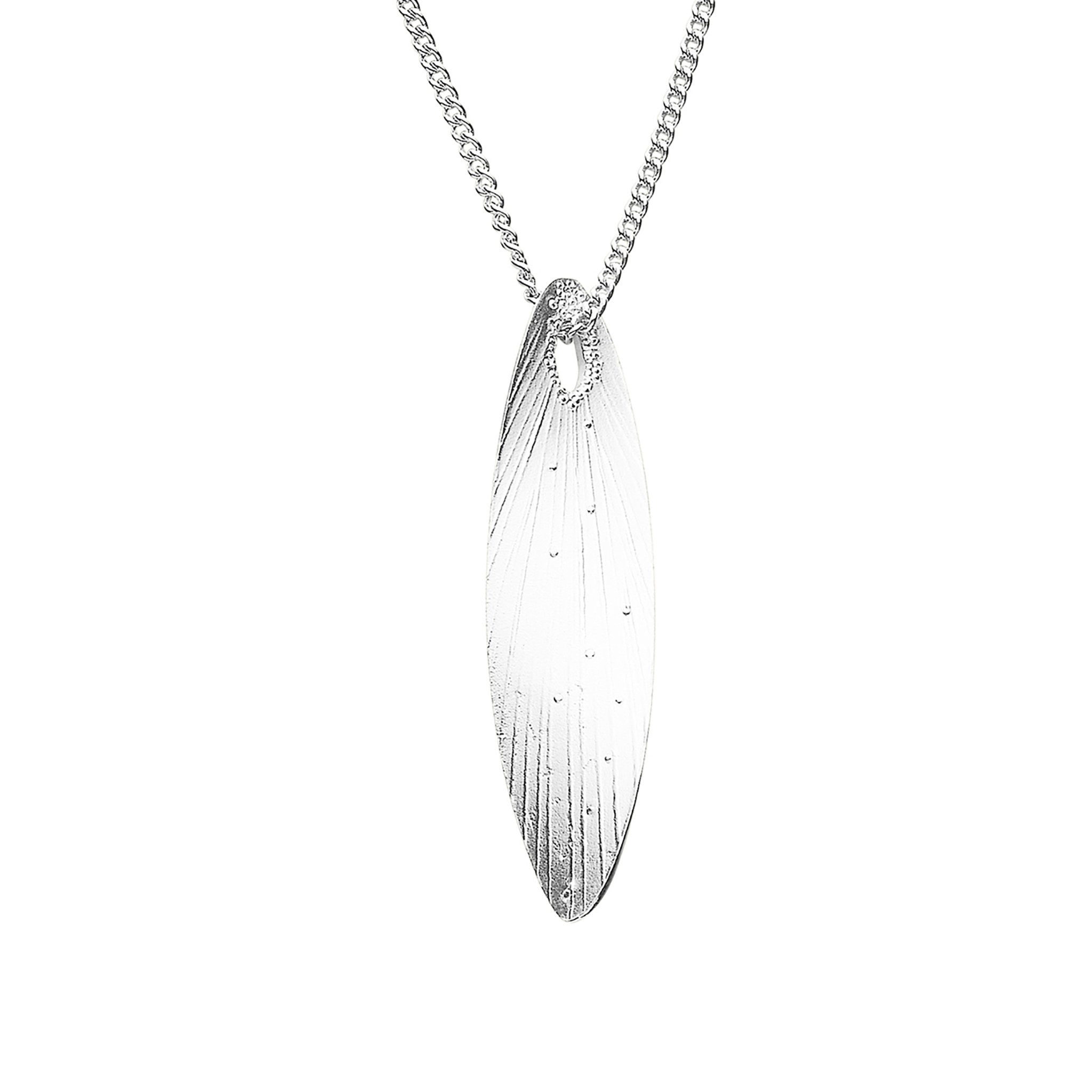 A silver pendant necklace featuring a leaf-shaped pendant that features a plant design.