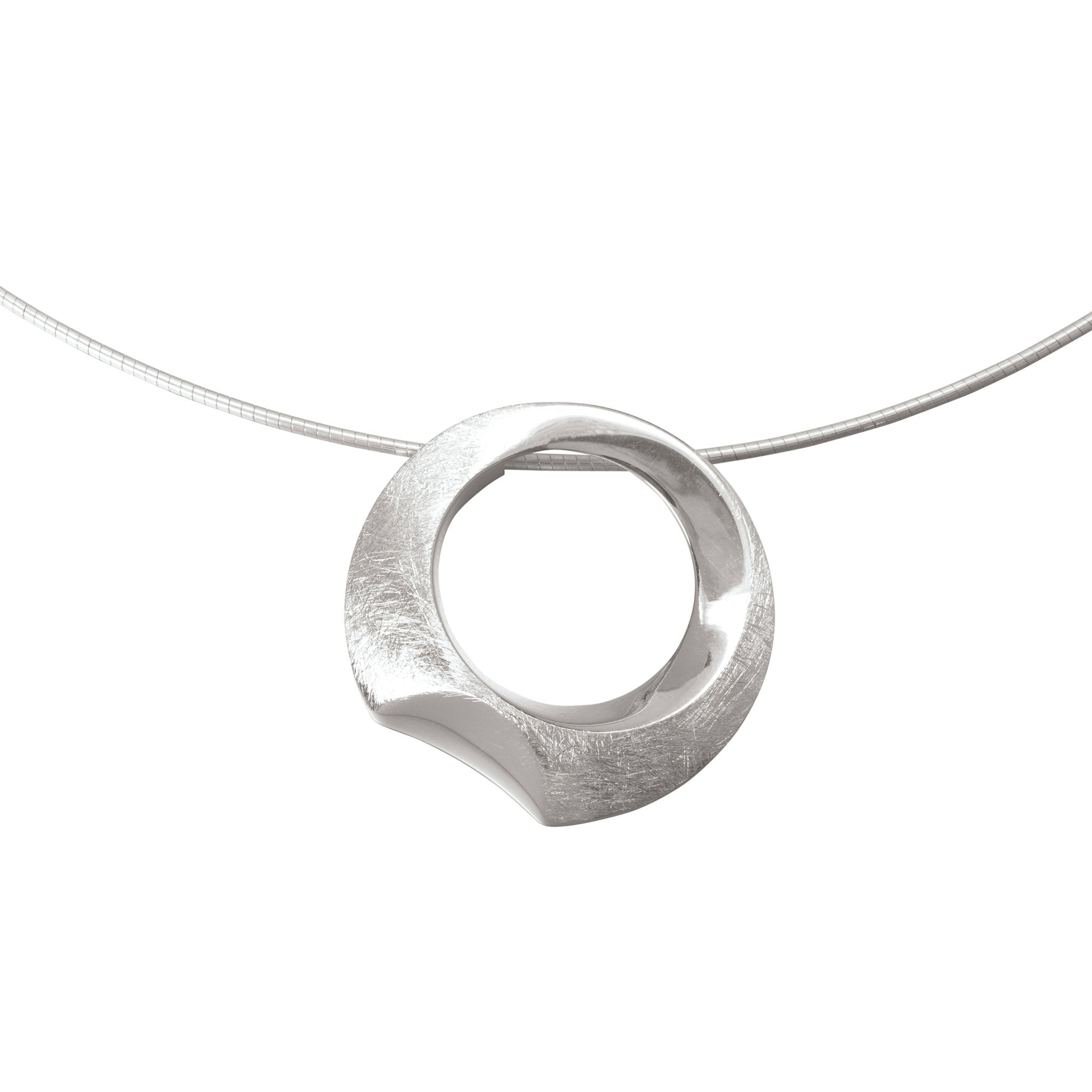 A silver necklace with a textured circular pendant