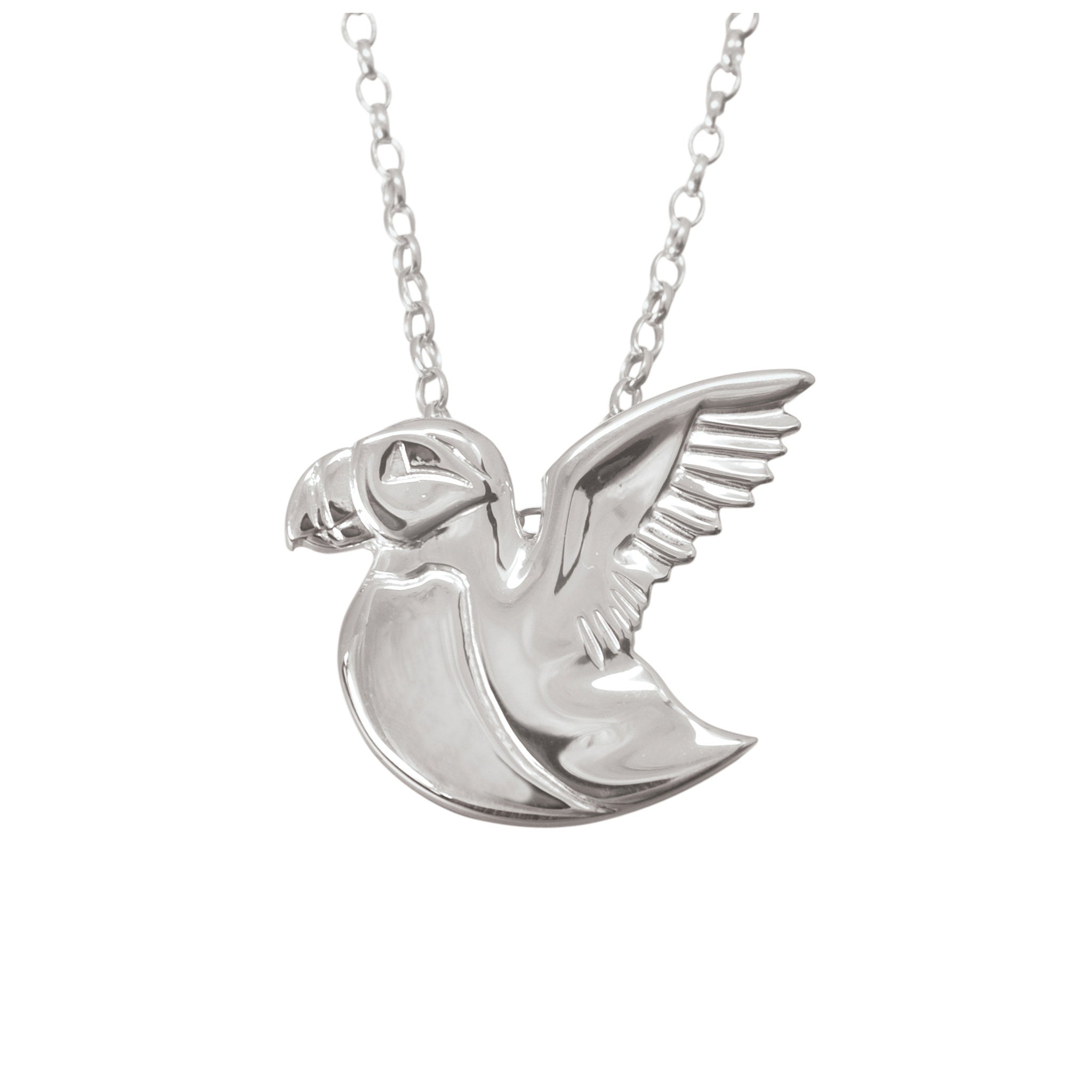 A silver pendant necklace featuring a three-dimensional puffin in flight design, displayed against a white background.