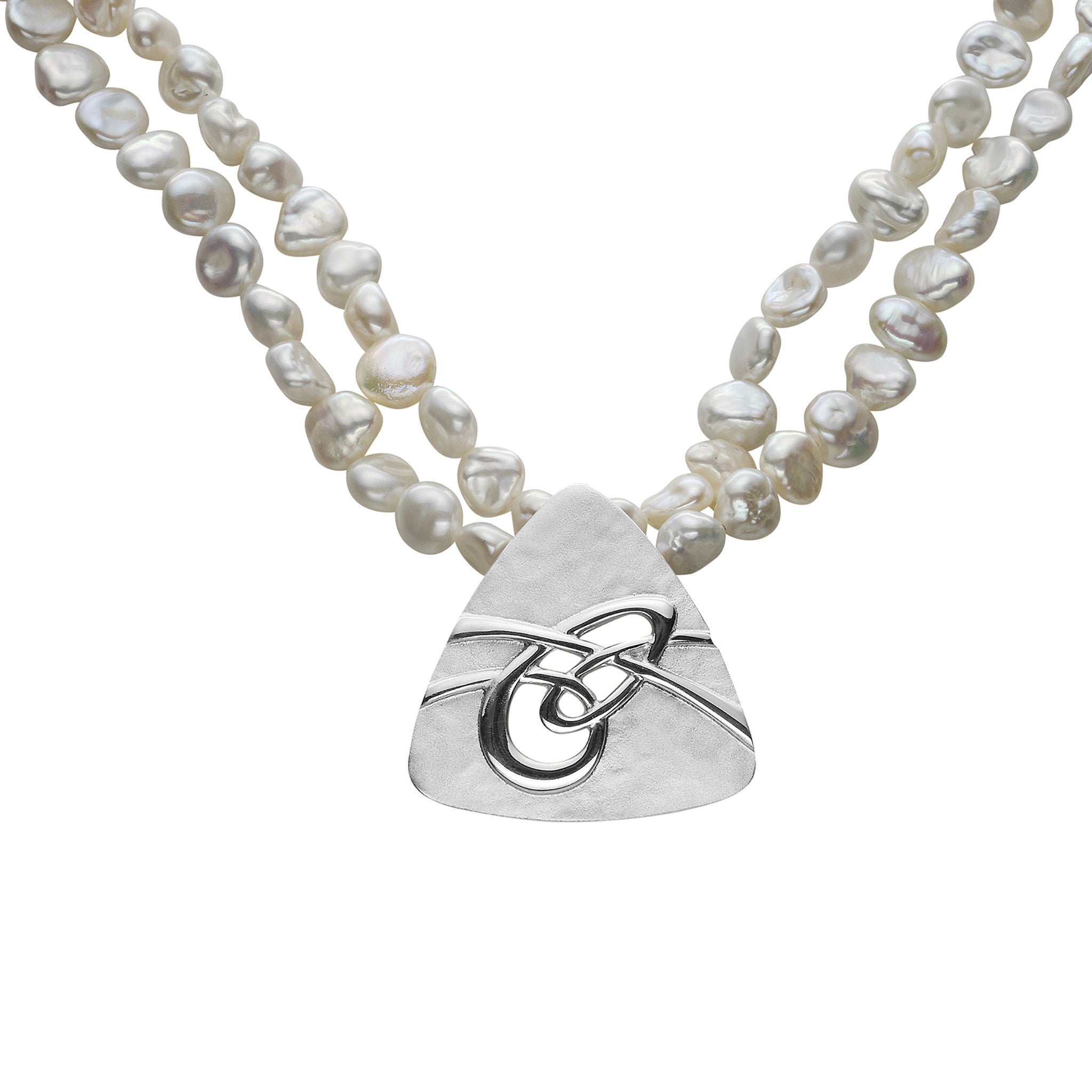 A pearl necklace with a silver pendant featuring a knotted celtic design
