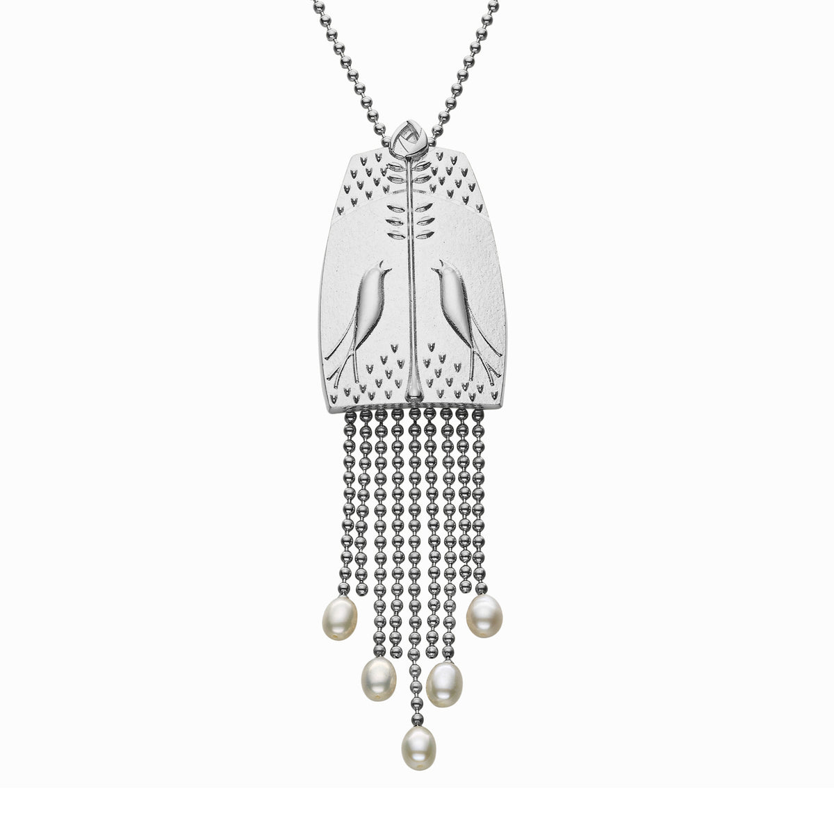 A silver necklace with a large silver pendant featuring bird and flower pattern with delicate chains hanging from the bottom with pearls