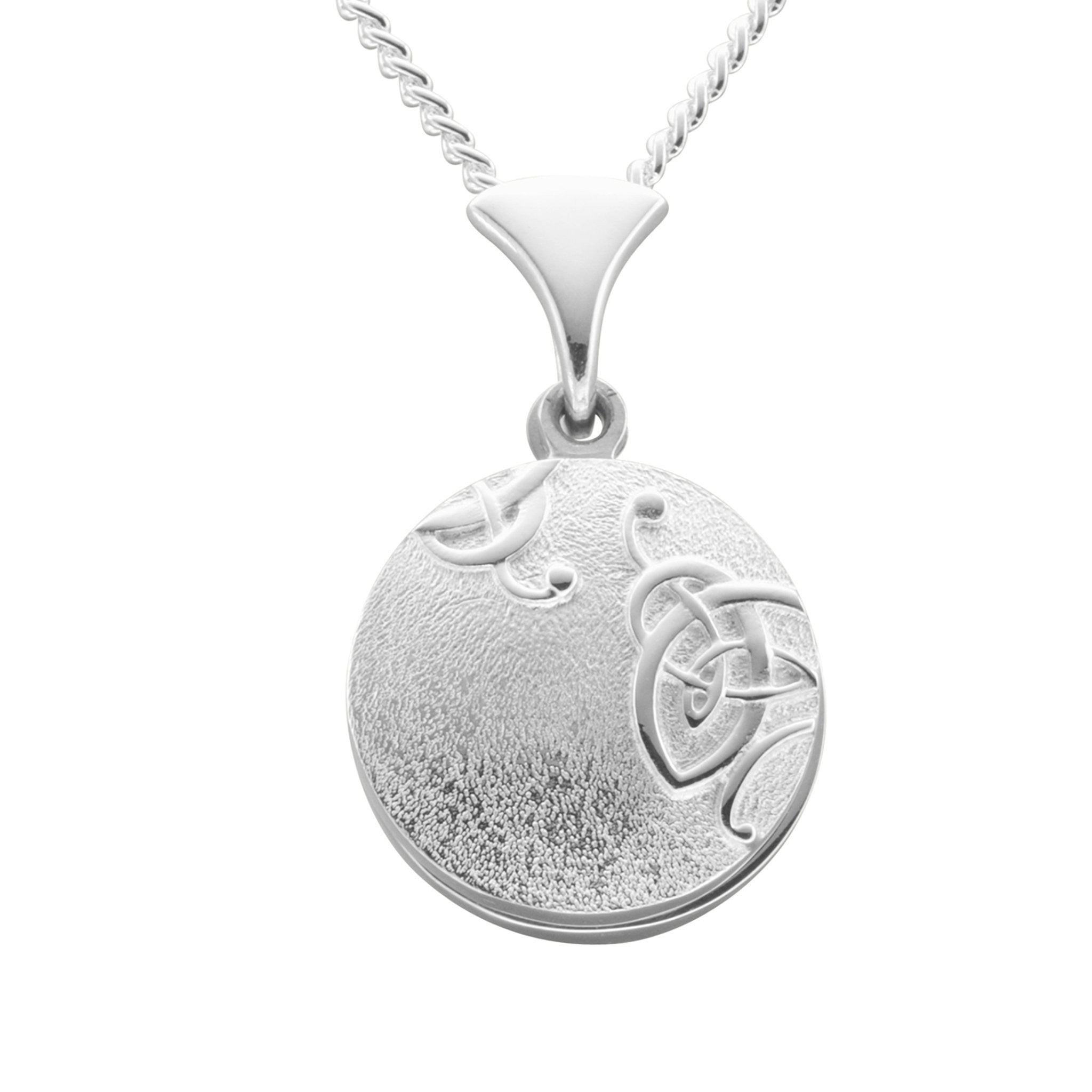 A silver necklace with an round pendant that has a simple geometric knotted pattern