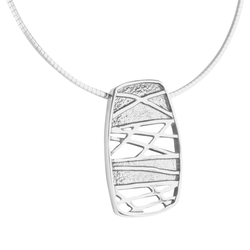 Ola Gorie silver Ness of Brodgar pendant, inspired by Neolithic art